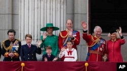 FILE - Members of the royal family greet the crowd from the balcony of Buckingham Palace after the Trooping The Colour parade, in London, June 17, 2023.