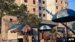 Pakistani army soldiers stand guard outside the Karachi Police Office compound a day after an attack by Pakistan's Taliban in Karachi on February 18, 2023. (Asif Hassan/AFP)