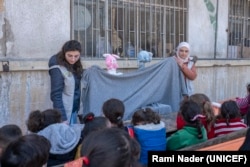 A UNICEF-supported child protection mobile team organized recreational activities for children in a shelter in Aleppo on Feb. 20, 2023, after a devastating earthquake had struck the city. (UNICEF)