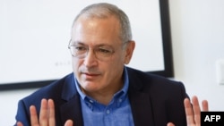 FILE - Exiled Russian opposition figure Mikhail Khodorkovsky addresses the media during a press breakfast in Berlin, Germany, Oct. 23, 2023. He recently spoke to VOA to share his views on the March 22, 2024, Islamic State terror attack on a concert venue in a Moscow suburb.