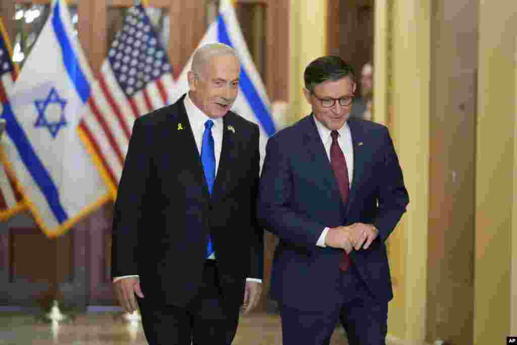 Israeli Prime Minister Benjamin Netanyahu is welcomed by Speaker of the House Mike Johnson, R-La., to the Capitol in Washington.