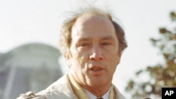 FILE - Then-Canadian Prime Minister Pierre Trudeau speaks at the White House in Washington, Feb. 21, 1977.