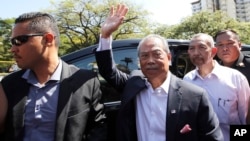 Malaysia's former Prime Minister Muhyiddin Yassin arrives at the Malaysian Anti-Corruption Commission's headquarters in Putrajaya, Kuala Lumpur, March 9, 2023. 
