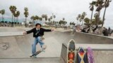 Expert skateboarder Di'Orr Greenwood, an artist born and raised in the Navajo Nation in Arizona, exits the concrete bowl in the Venice Beach neighborhood in Los Angeles, March 20, 2023.