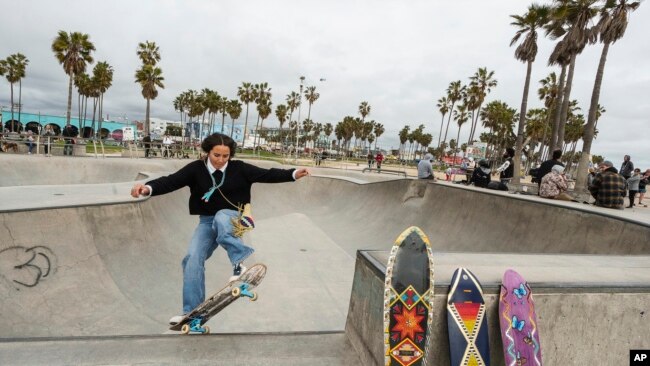 Expert skateboarder Di'Orr Greenwood, an artist born and raised in the Navajo Nation in Arizona, exits the concrete bowl in the Venice Beach neighborhood in Los Angeles, March 20, 2023.