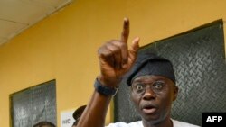 FILE — Lagos Governor and Ruling All Progressives Congress (APC) candidate to re-election Babajide Sanwo Olu speaks after voting at a polling station for a gubernatorial and House of Assembly candidates during local elections, in Lagos, on March 18, 2023