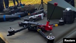 FILE - An FPV (first person view) drone and additional equipment are seen at a training facility for military FPV drone pilots, at an undisclosed location in Zhytomyr region, Ukraine, Sept. 14, 2023.