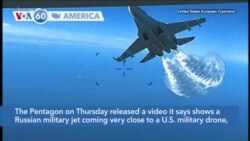 VOA60 America - US Releases Video of Encounter Between Russian Fighter Jets and US Drone over Black Sea