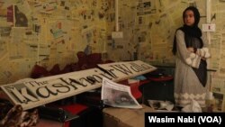 A member of staff from The Kashmir Walla stands in the newsroom on Aug. 21, 2023. The media outlet received an eviction notice to vacate the office.