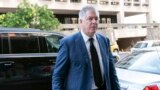FILE - Attorney M. Evan Corcoran arrives at federal court in Washington, July 22, 2022. 