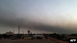 Smoke billows in Khartoum, Sudan, on May 23, 2023, after a one-week ceasefire between Sudan's army and paramilitary Rapid Support Forces officially went into force.