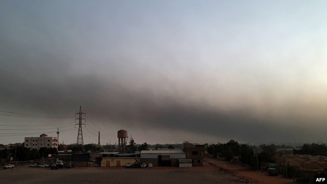 Smoke billows in Khartoum, Sudan, on May 23, 2023, after a one-week ceasefire between Sudan's army and paramilitary Rapid Support Forces officially went into force.