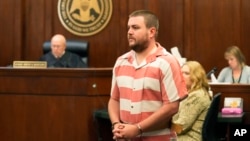 FILE - Former Rankin County Sheriff’s Deputy Christian Dedmon appears in court in Brandon, Miss., Aug. 14, 2023. Dedmon was sentenced March 20, 2024, to 40 years in prison for his part in the racist torture of two Black men by a group of white officers.