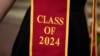 A recent graduate wears a garment with their graduation year on the University of Southern California campus April 25, 2024, in Los Angeles. 
