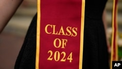 FILE - A recent graduate wears a garment with their graduation year April 25, 2024, in Los Angeles. 