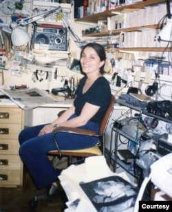 NPR correspondent Sylvia Poggioli sits in her Rome office in the late 1980s. (Piero Benetazzo photo)