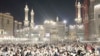 Pilgrims leave after offering prayers outside at the Grand Mosque during the annual Hajj pilgrimage in Mecca, Saudi Arabia, June 14, 2024.