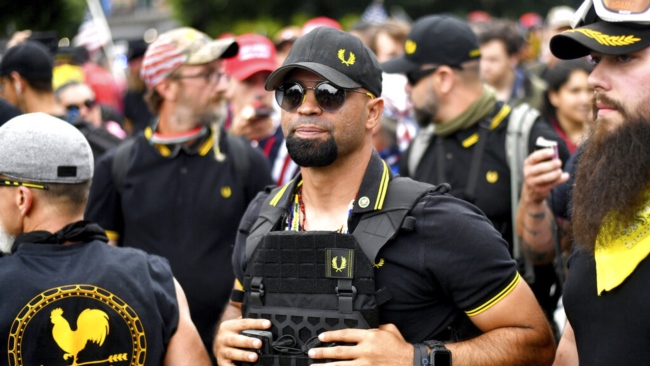 FILE - Then-Proud Boys chairman Enrique Tarrio rallies in Portland, Ore., Aug. 17, 2019. Tarrio, who identifies as an Afro-Cuban, is an illustration of how the extremist fringes today boast support from virtually every corner of the American melting pot.