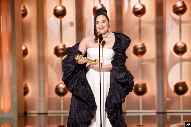 Lily Gladstone accepts the award for best female actor in motion picture - drama for her role in "Killers of the Flower Moon" during the 81st Annual Golden Globe Awards in Beverly Hills, Calif., on Sunday, Jan. 7, 2024. (Sonja Flemming/CBS via AP)