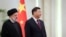 Iranian President Ebrahim Raisi stands next to Chinese President Xi Jinping during a welcoming ceremony in Beijing, China, Feb. 14, 2023. (West Asia News Agency/Handout via Reuters)