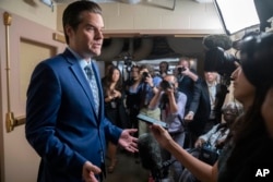 Rep. Matt Gaetz speaks to reporters at the Capitol in Washington, Oct. 3, 2023.