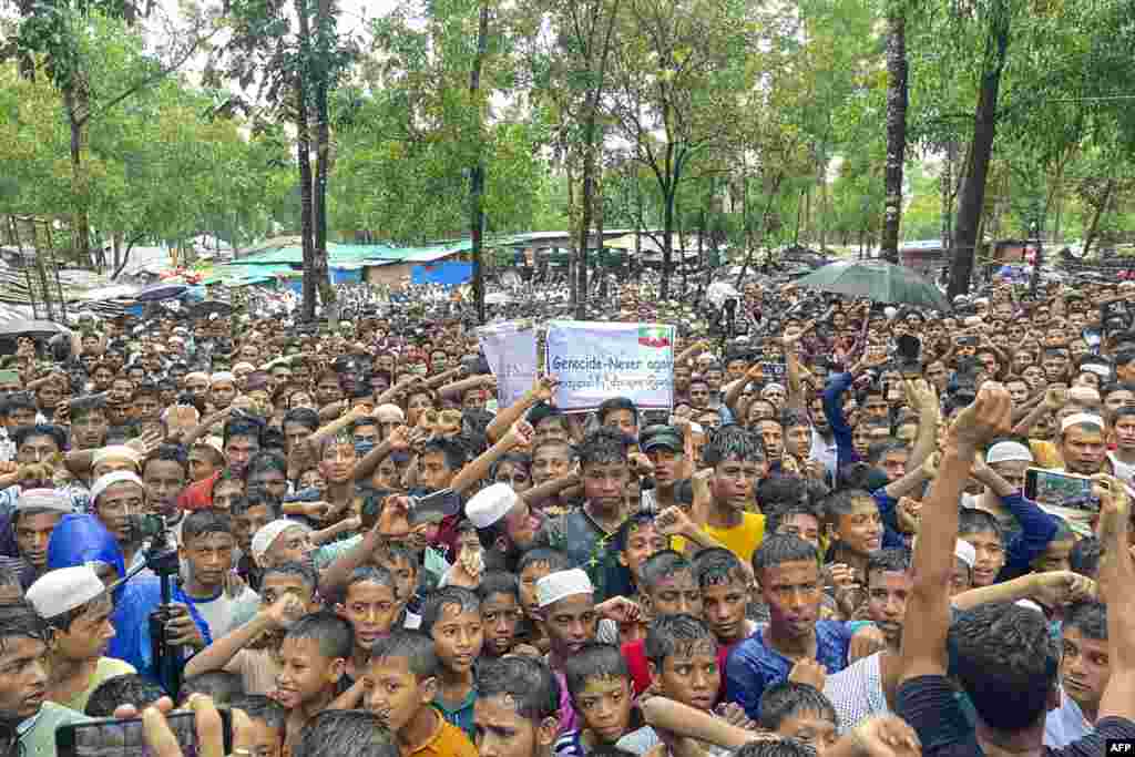 Rohingya refugees gather for a rally marking the 6th anniversary of genocide day, in Ukhia, Bangladesh, demanding their secured and dignified return to Myanmar.