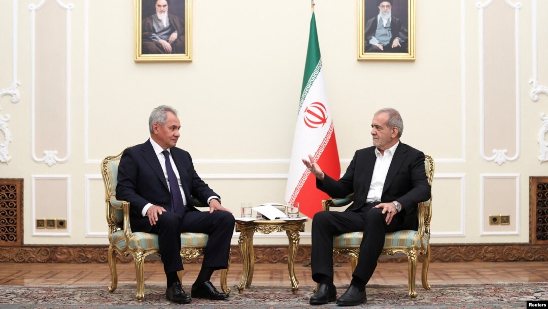 Iran's President Masoud Pezeshkian, right, meets with Russian Security Council's Secretary Sergei Shoigu in Tehran, Iran, Aug. 5, 2024. (Iran's Presidency/WANA/Handout via Reuters)