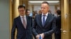 Hungary's Foreign Minister Peter Szijjarto, right, arrives for a meeting of EU foreign ministers at the European Council building in Brussels, July 22, 2024. 