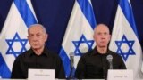 FILE - Israeli prime minister Benjamin Netanyahu and defense minister Yoav Gallant during a press conference at Kirya military base in Tel Aviv , Oct. 28, 2023. 