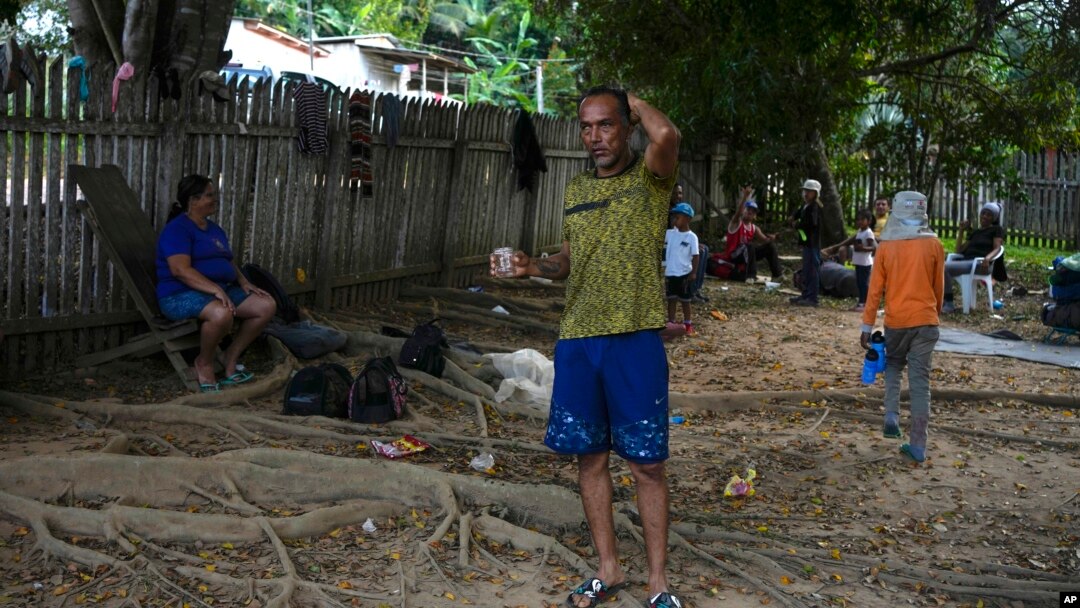 Venezuelan migrant Samuel Rodriguez stands on the grounds of the shelter in Assis, Brazil, June 20, 2024. 