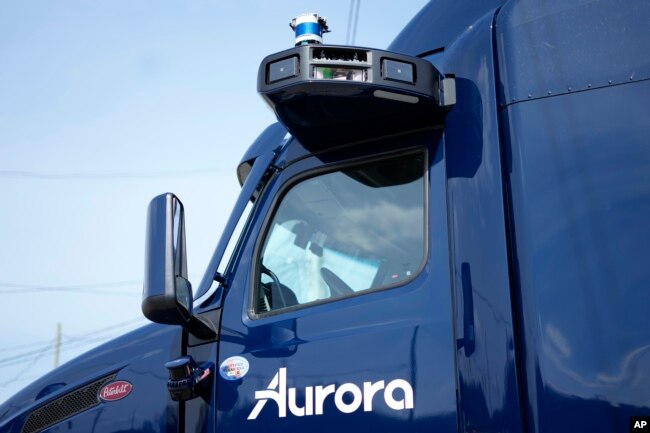 A self-driving tractor trailer is displayed at a test track in Pittsburgh, Thursday, March 14, 2024. (AP Photo/Gene J. Puskar)