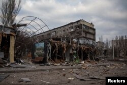 A general view shows an empty street and buildings damaged by a Russian military strike, as Russia's attack on Ukraine continues in the front line city of Bakhmut, Ukraine, March 3, 2023.