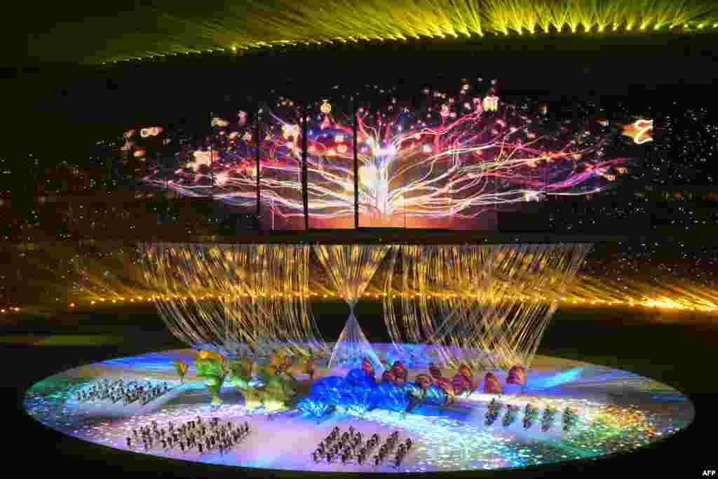 Performers take part in the opening ceremony of the 32nd Southeast Asian Games (SEA Games) at the Morodok Techo National Stadium in Phnom Penh.