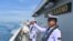 Sejumlah perwira TNI Angkatan Laut berdiri di dek KRI Bung Karno-369 dalam latihan bersama Multilateral Naval Exercise Komodo (MNEK) 2023 di Laut Makassar, Sulawesi Selatan, 5 Juni 2023. (Foto: M Risyal Hidayat/Antara Foto via Reuters)