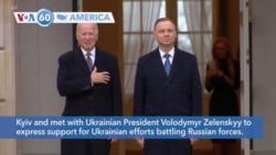 VOA60 America - US President Biden visits Poland