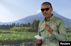 Rwanda's incumbent president and presidential candidate for the Rwandan Patriotic Front (RPF) Paul Kagame prepares to cast his ballot during the presidential election at the SOS Kinyinya polling center in Kigali, July 15, 2024.