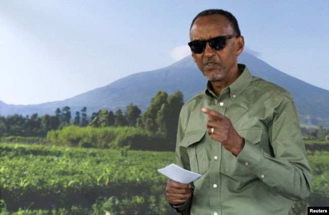 Rwanda's incumbent president and presidential candidate for the Rwandan Patriotic Front (RPF) Paul Kagame prepares to cast his ballot during the presidential election at the SOS Kinyinya polling center in Kigali, July 15, 2024.