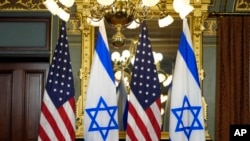 Israeli and American flags appear before a meeting between Vice President Kamala Harris and Israeli Prime Minister Benjamin Netanyahu at the Vice President's Ceremonial Office on the White House complex in Washington, July 25, 2024.