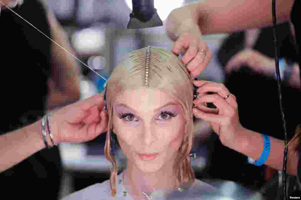 Dylan Mulvaney is prepared backstage before The Blonds present their latest collection during New York Fashion Week in New York City, Sept. 13, 2023.