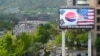 FILE - A screen shows flags of South Korea and the United States to celebrate the 70th anniversary of the South Korea-U.S. alliance in Seoul, South Korea, April 26, 2023. 