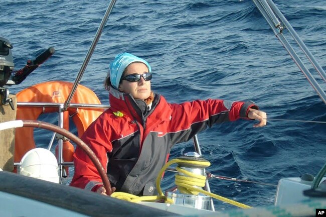 FILE - Sister Nathalie Becquart sails during a regatta in Brest, France on April 2010. Becquart, the first female undersecretary in the Vatican's Synod of Bishops, is one of the highest-ranking women at the Vatican. (Bishop Conference of France via AP)