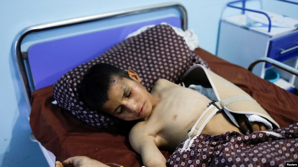 FILE - A 12-year-old injured during a recent earthquake receives treatment at a hospital in Herat, Afghanistan, on Oct. 11, 2023. The World Health Organization said on Oct. 20 that the survivors of the series of quakes desperately need essential health services.