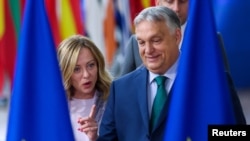 Премьер-министр Венгрии Виктор Орбан и глава итальянского правительства Джорджия Мелони на саммите лидеров ЕС в Брюсселе, 27 июня 2024 года