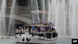 Team Greece's boat parades along the Seine river in Paris, during the opening ceremony of the 2024 Summer Olympics, July 26, 2024.