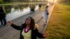 Worshipers listen to a sermon by Mark Batterson, lead pastor of National Community Church, during a sunrise Easter service at the Lincoln Memorial in Washington, March 31, 2024.