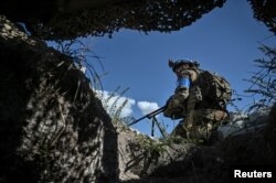 A serviceman of Ukraine's 3rd Separate Assault Brigade conducts a reconnaissance mission, amid Russia's attack on Ukraine, near Bakhmut, Ukraine, Sept. 7, 2023.