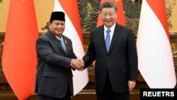 资料照片: 2024年4月1日中国国家主席习近平与印度尼西亚当选总统普拉博沃·苏比安托中国北京人民大会堂会晤