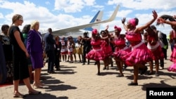 First lady Jill Biden watches a dance performance as she arrives during the first leg of her African visit, at the Hosea Kutako International Airport in Windhoek, in Namibia, Feb. 22, 2023. (REUTERS/Siphiwe Sibeko)