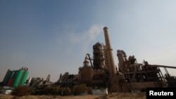 FILE - A general view of Heidelberg Materials cement plant at Kattameya District in Cairo, Egypt, September 4, 2023.