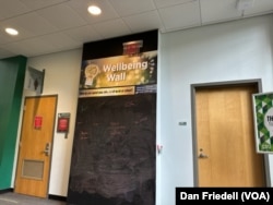 The wellbeing wall with messages from students.